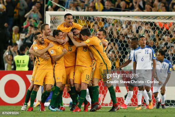 Mile Jedinak of the Australia celebrates with teammates after scoring the first goal during the 2nd leg of the 2018 FIFA World Cup Qualifier between...