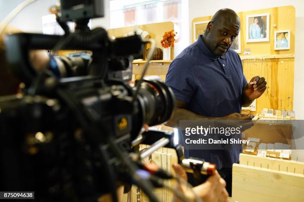 Shaquille ONeal on camera Shopping Small at beehive in Atlanta during a recent video shoot for Small Business Saturday on October 24, 2017 in...