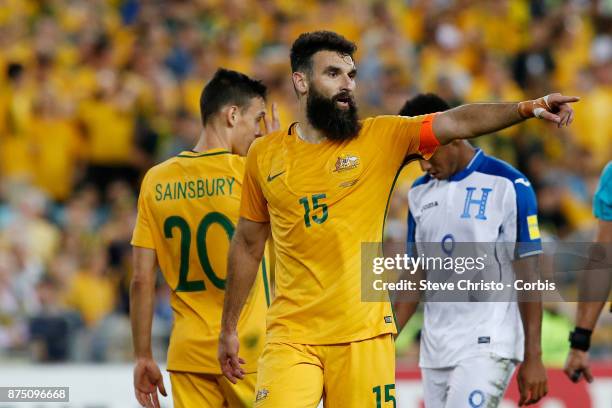 Mile Jedinak of the Australia marshals his troops before a corner during the 2nd leg of the 2018 FIFA World Cup Qualifier between the Australia and...