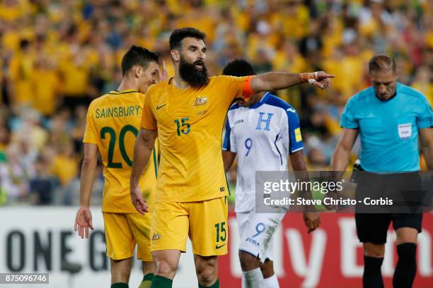 Mile Jedinak of the Australia marshals his troops before a corner during the 2nd leg of the 2018 FIFA World Cup Qualifier between the Australia and...