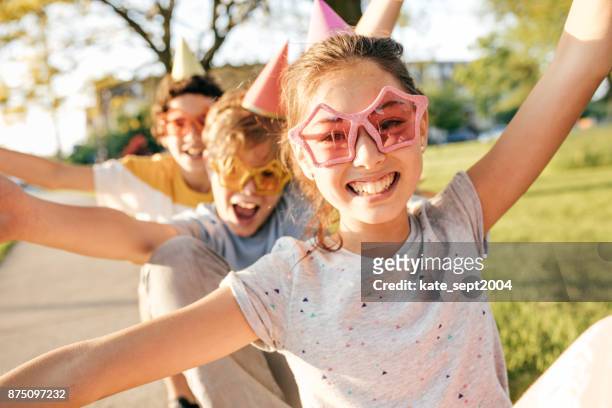 kids having fun - birthday girl stock pictures, royalty-free photos & images