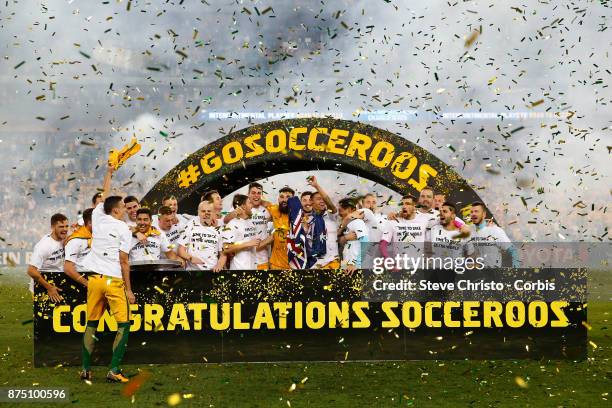 The Australian team celebrate after making the 2018 World Cup during the 2nd leg of the 2018 FIFA World Cup Qualifier between the Australia and...