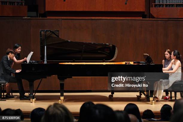 Yun-Chin Zhou, left, and Chaeyoung Park, the winners of the 2017 Gina Bachauer Piano Competition, performing William Bolcom's "Recuerdos for Two...