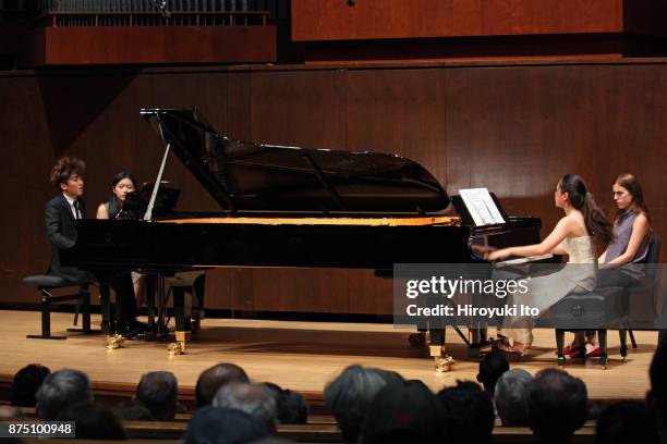 Yun-Chin Zhou, left, and Chaeyoung Park, the winners of the 2017 Gina Bachauer Piano Competition, performing William Bolcom's "Recuerdos for Two...