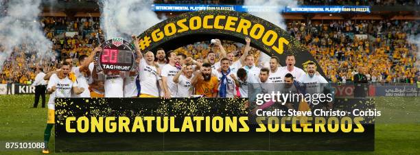 The Australian team celebrate after making the 2018 World Cup during the 2nd leg of the 2018 FIFA World Cup Qualifier between the Australia and...