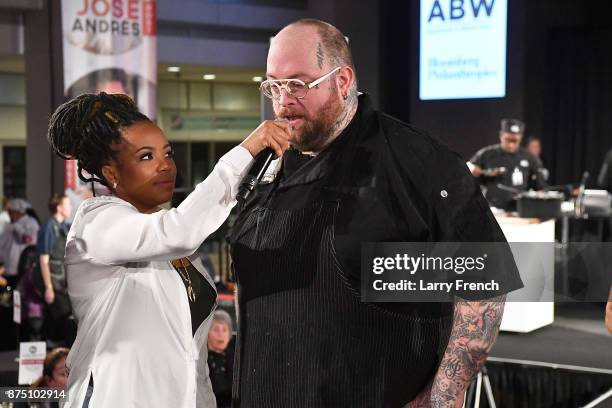 Host Tregaye Fraser interviews Chef Hamilton Johnson of Honeysuckle onstage at DC Central Kitchen's Capital Food Fight on November 16, 2017 at the...