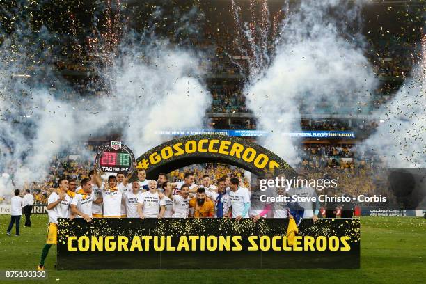 The Australian team celebrate after making the 2018 World Cup during the 2nd leg of the 2018 FIFA World Cup Qualifier between the Australia and...