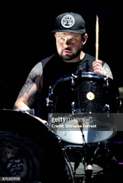Ben Thatcher of Royal Blood performs live on stage at Manchester Arena on November 16, 2017 in Manchester, England.