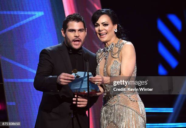 Marco de la O and Maribel Guardia speak onstage at the 18th Annual Latin Grammy Awards at MGM Grand Garden Arena on November 16, 2017 in Las Vegas,...