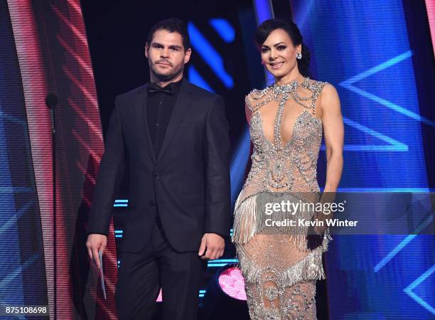 Marco de la O and Maribel Guardia speak onstage at the 18th Annual Latin Grammy Awards at MGM Grand Garden Arena on November 16, 2017 in Las Vegas,...