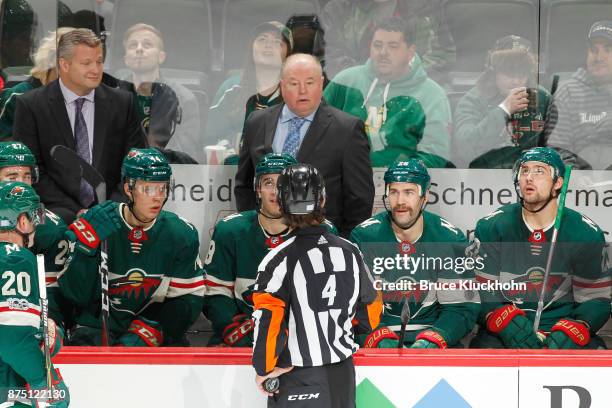 Minnesota Wild head coach Bruce Boudreau talks with an official after a goal is waved off following a video review against the Nashville Predators...