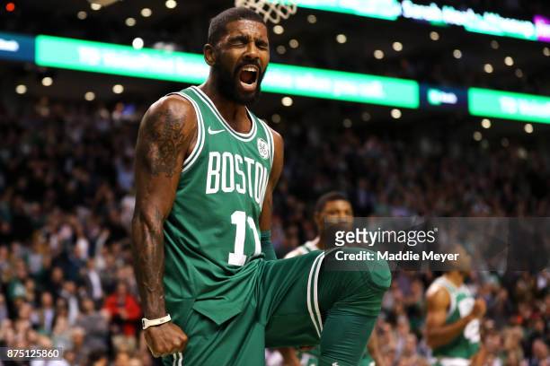 Kyrie Irving of the Boston Celtics celebrates during the fourth quarter against the Golden State Warriors at TD Garden on November 16, 2017 in...