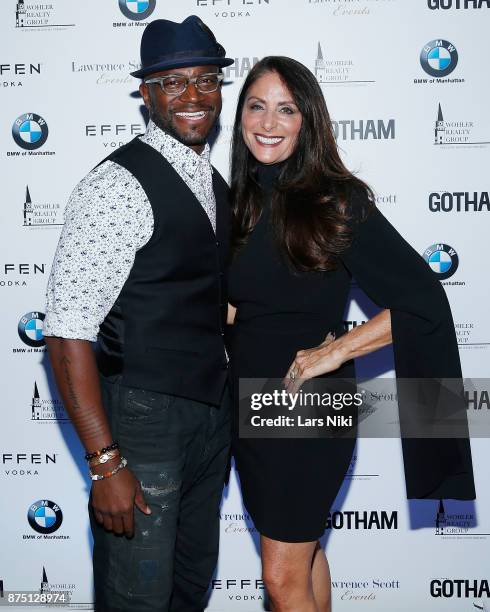 Actor Taye Diggs and Gotham Magazine publisher Lynn Scotti Kassar attend the Gotham Men's Issue Celebration at the BMW of Manhattan Showroom on...