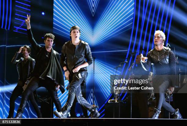 Erick Colon, Zabdiel De Jesus, Christopher Velez, and Richard Camacho of CNCO perform onstage during The 18th Annual Latin Grammy Awards at MGM Grand...