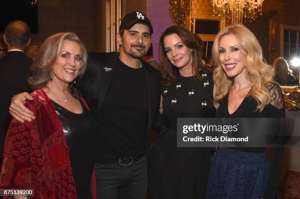 Susan Galeas, Brad Paisley, Kimberly Williams-Paisley and Kim Campbell attend ACM Lifting Lives featuring Little Big Town hosted and underwritten by...