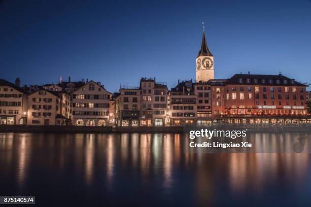 zurich old town reflected in limmat river at night, switzerland - zurich cafe stock pictures, royalty-free photos & images