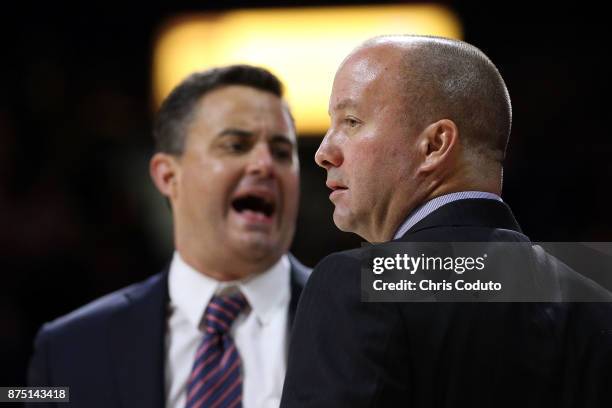 Assistant coach Mark Phelps of the Arizona Wildcats watches the action during the second half of the college basketball game against the Cal State...