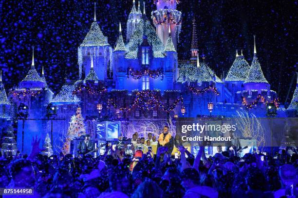 In this handout photo provided by Disney Parks, Jason Derulo performs during a taping of "The Wonderful World of Disney: Magical Holiday Celebration"...