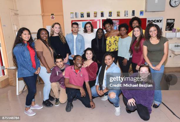 Orange is The New Black cast memebers Julie Lake and Vicky Jeudy pose with art students at The Artists Project Visits Performing Arts Students At...