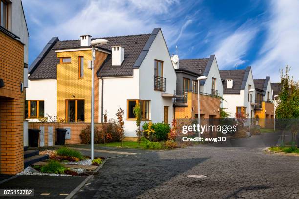 modern complex of residential buildings in the suburb - housing development stock pictures, royalty-free photos & images