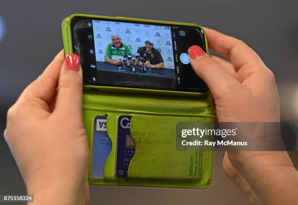 Perth , Australia - 11 November 2017; Ireland team manager Joe Kernan and the Australian manager Chris Scott, reflected in a smart phone, during the...