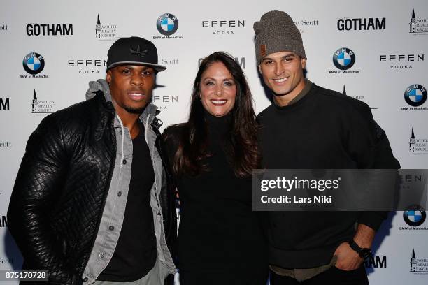 Evan Betts and Gotham Magazine publisher Lynn Scotti Kassar attend the Gotham Men's Issue Celebration at the BMW of Manhattan Showroom on November...