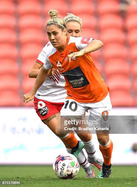 Katrina-Lee Gorry of the Roar breaks away from the defence during the round four W-League match between Brisbane and Adelaide at Suncorp Stadium on...