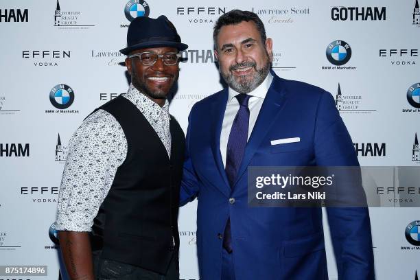 Actor Taye Diggs and Arturo Pineiro attend the Gotham Men's Issue Celebration at the BMW of Manhattan Showroom on November 16, 2017 in New York City.