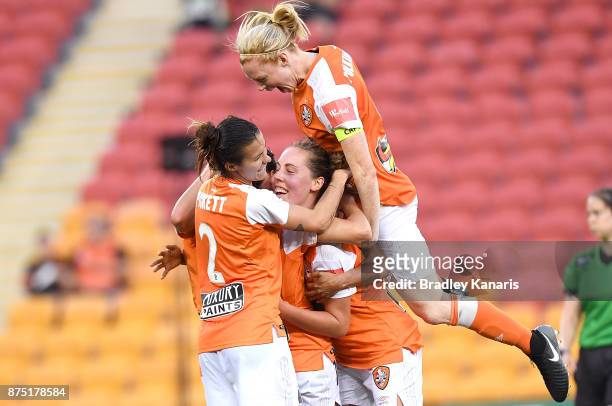 Hayley Raso of the Roar is congratulated by team mates after scoring a goal during the round four W-League match between Brisbane and Adelaide at...