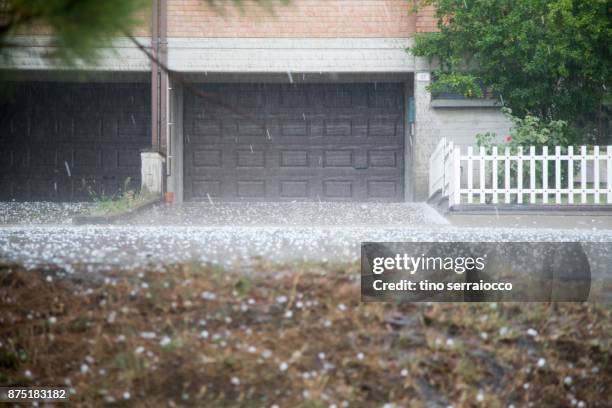 during haistorm from sky with rain - hail foto e immagini stock