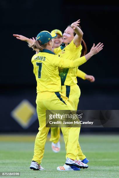 Megan Schutt of Australia celebrates taking the wicket of Sarah Taylor of England during the first Women's Twenty20 match between Australia and...