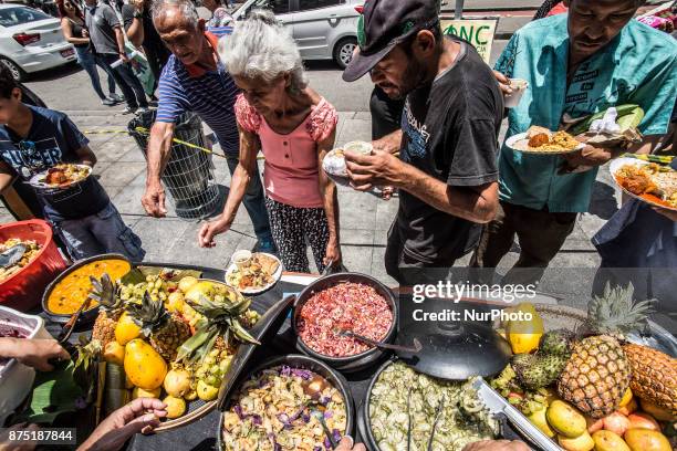 Farmers, food security activists and chefs on 16 November 2017 promoted a banqueting in front of the Municipal Theater in downtown Sao Paulo, Brazil,...