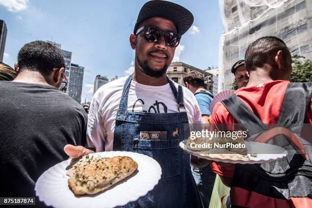 Farmers, food security activists and chefs on 16 November 2017 promoted a banqueting in front of the Municipal Theater in downtown Sao Paulo, Brazil,...