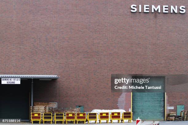 Workers in the Siemens Dynamowerk production Plant on September 28, 2010 in Berlin, Germany. Siemens has announced large-scale layoffs that will...