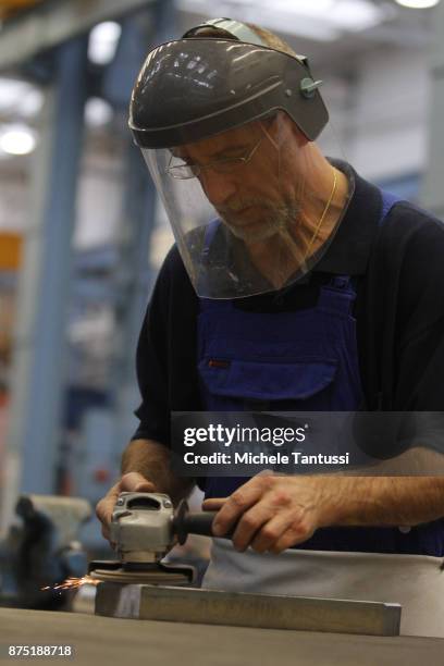 Workers in the Siemens Dynamowerk production Plant on September 28, 2010 in Berlin, Germany. Siemens has announced large-scale layoffs that will...