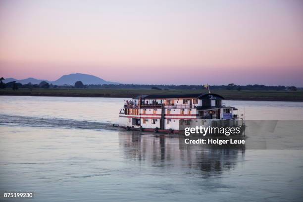 river cruise ship irrawaddy princess 2 (irrawaddy princess river cruise) on ayeyarwady (irrawaddy) river at dusk, near bagan, mandalay, myanmar - princess cruises stock pictures, royalty-free photos & images