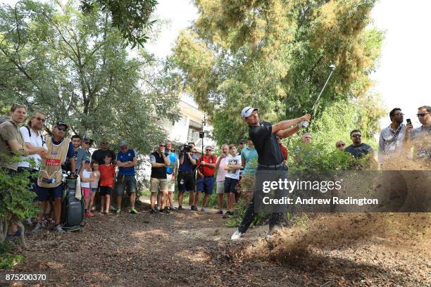 Justin Rose of England hits his second shot on the 2nd hole during the second round of the DP World Tour Championship at Jumeirah Golf Estates on...