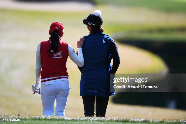 Bo-Mee Lee and Ha-Neul Kim of South Korea walk on the 3rd hole during the second round of the Daio Paper Elleair Ladies Open 2017 at the Elleair Golf...