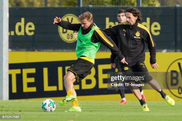 Marcel Schmelzer of Dortmund and Neven Subotic of Dortmund battle for the ball during a training session at BVB trainings center on November 13, 2017...