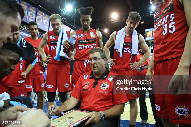 Wildcats coach Trevor Gleeson talks to players during the round seven NBL match between Brisbane and Perth at Brisbane Entertainment Centre on...
