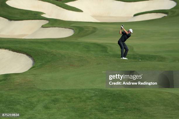 Justin Rose of England hits his second shot on the 7th hole during the second round of the DP World Tour Championship at Jumeirah Golf Estates on...