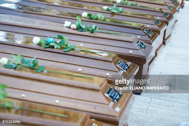 The coffins of 26 teenage migrant girls found dead in the Mediterranean in early November, are pictured in the cemetery of Salerno, southern Italy,...
