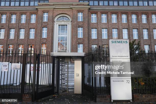 The Company Logo in front of the Siemens dynamo factory on November 17, 2017 in Berlin, Germany. Siemens announced the day before it will be laying...