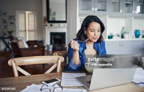 nothing inspires productivity like a healthy lunch - telecommuting eating stock pictures, royalty-free photos & images