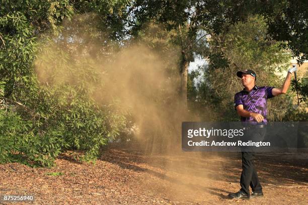 Scott Hend of Australia hits his second shot on the 15th hole during the second round of the DP World Tour Championship at Jumeirah Golf Estates on...