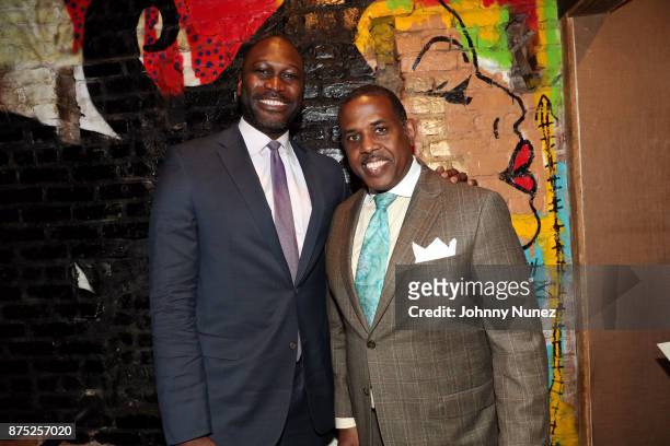 Commissioner of the NYC Department of Small Business Services Gregg Bishop and New York State Senator Kevin S. Parker attend the Caribbean Social...