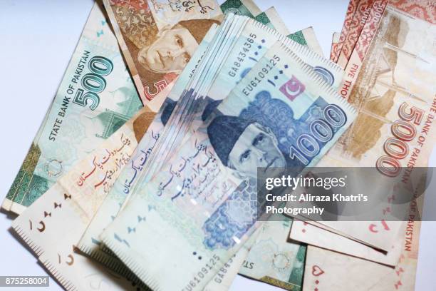 pakistani currency - pakistan currency stock pictures, royalty-free photos & images