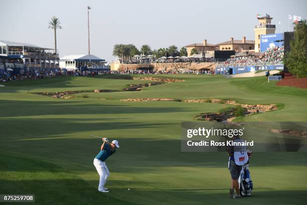 Matthew Fitzpatrick of England hits his second shot on the 18th hole during the second round of the DP World Tour Championship at Jumeirah Golf...