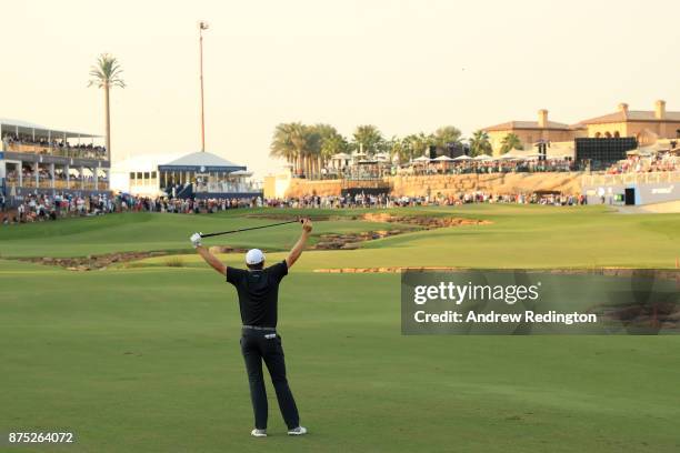 Justin Rose of England reacts to his second shot on the 18th hole during the second round of the DP World Tour Championship at Jumeirah Golf Estates...