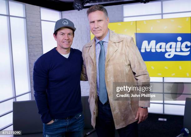 Mark Wahlberg and Will Ferrell pose for a photo during a vist to the Magic FM Studio on November 17, 2017 in London, England.